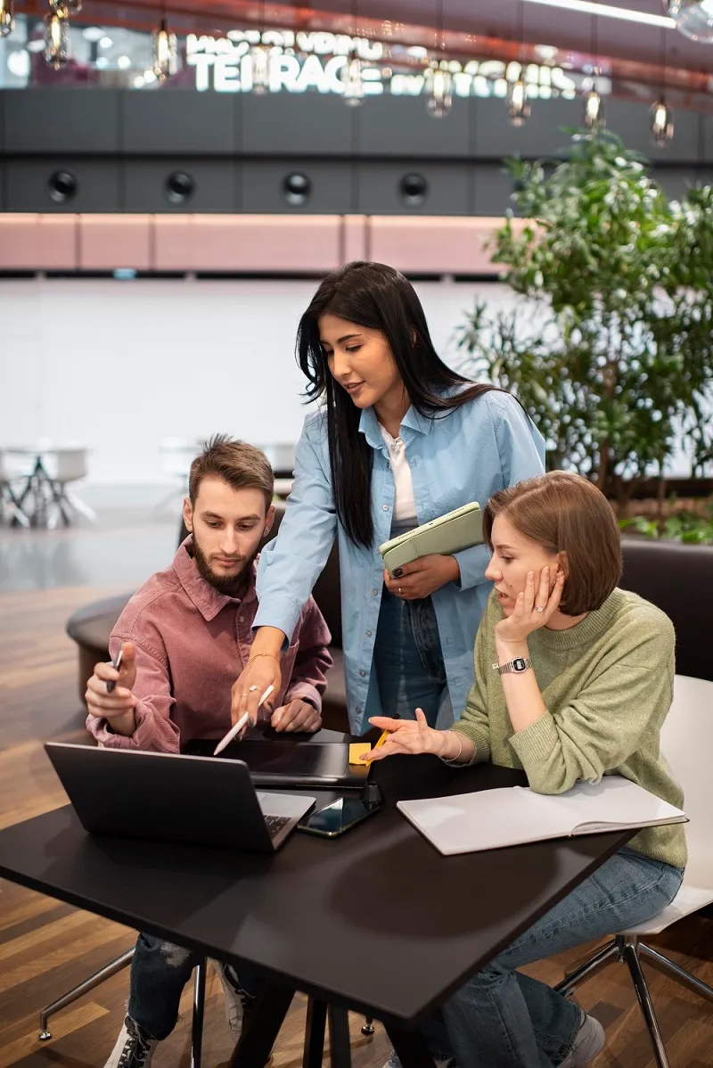 Team collaborating on a project, reflecting Duskbyte’s approach to delivering innovative web development, SaaS solutions, and cloud-based services.